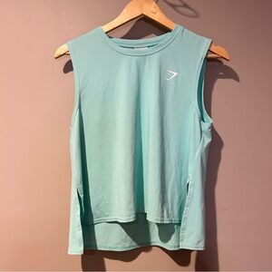 Gymshark Women's Muscle Athleisure Tee in aquamarine hi low side slits  size M